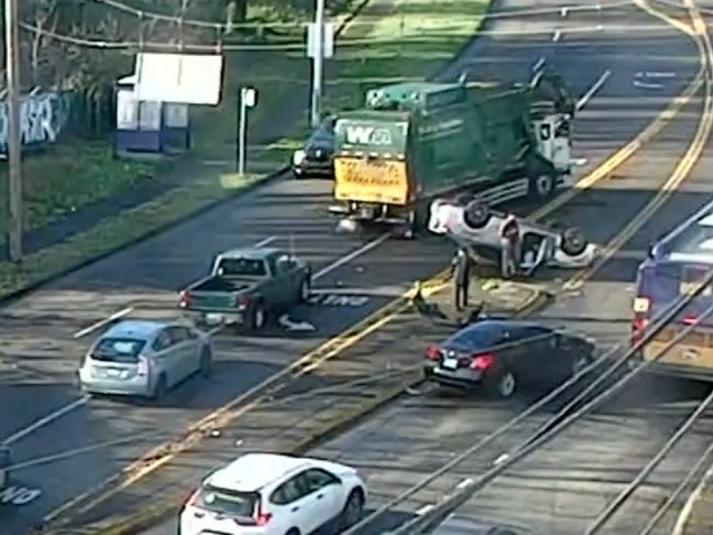 UPDATE: Flipped-car crash on Highland Park Way hill